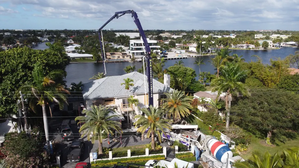 Boom pump at a waterfront estate